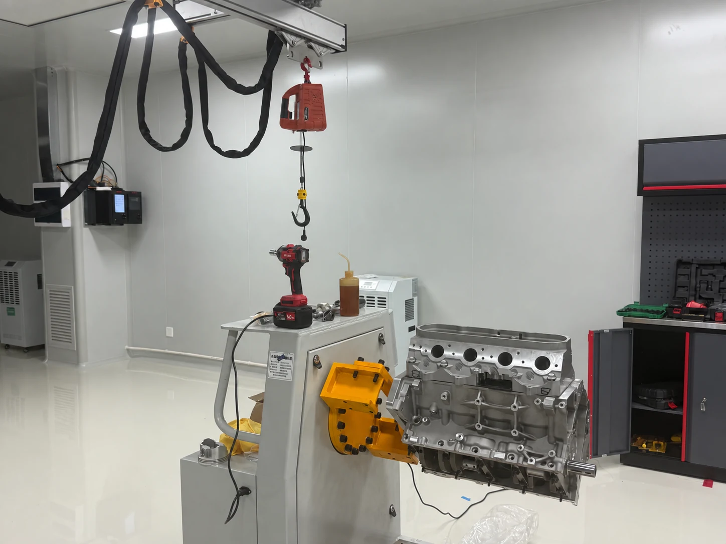 Engine block mounted on an assembly fixture in the PowerPulse workshop